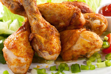 Roasted chicken drumsticks and vegetables