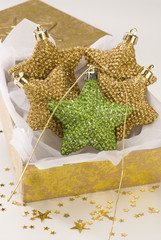 Golden and green Christmas stars arrangement.