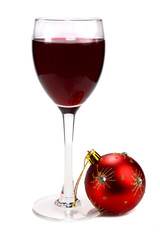 glass of red wine and decoration for ñhristmas