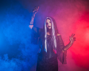 Gothic girl on red-blue smoke background