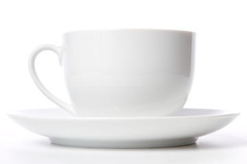 Coffee cup and grain on white background