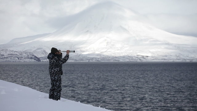 man with a telescope