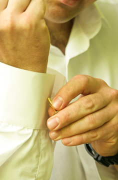 Putting On Cuff Links