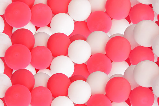 decorative pink and white balloons