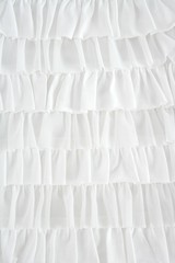 pleated skirt fabric fashion in white closeup