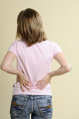 woman hurting from back pain