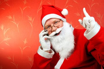 santa claus with mobile phone