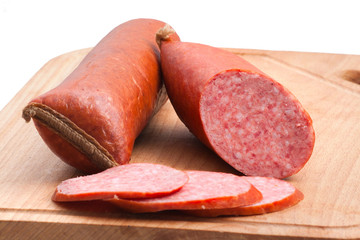 meat delicatessen on the board isolated on the white