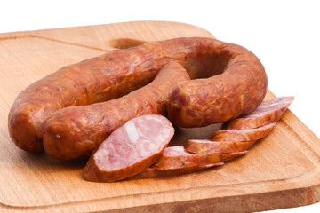 meat delicatessen on the board isolated on the white