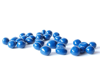 Chocolate blueberries on a white background