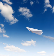 Paper planes in blue sky