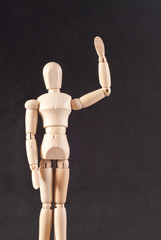 Wooden Doll Waving Hello