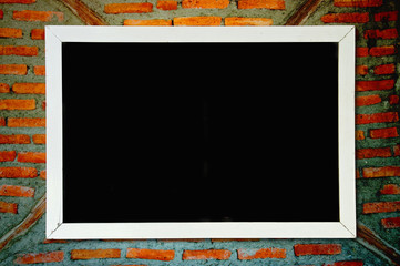 Chalkboard on old wall