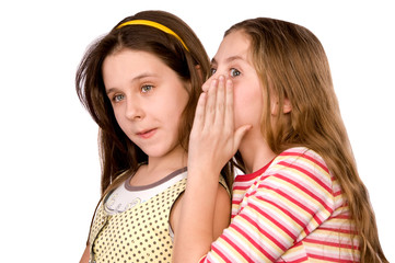 Two girls in the age of ten and eleven isolated on white