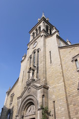 Fototapeta na wymiar Clocher de l'église de l'Immaculée Conception à Paris 