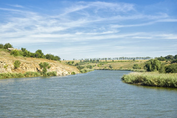 Fototapeta na wymiar Ukrainian rural landscape with twisting river.