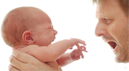 crying baby with father