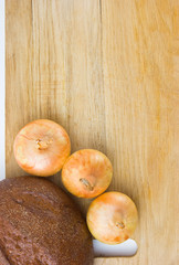 bread and onions on a cutting board