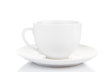 Coffee cup and grain on white background