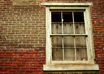 Fototapeta na wymiar Window on a abandoned building