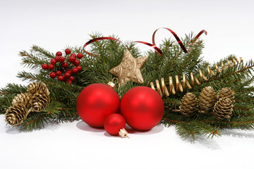 Christmas decoration with the twigs of the spruce and baubles