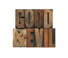 the words good and evil in old wood type