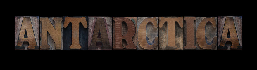 the word Antarctica in old letterpress wood type
