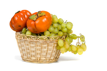 Ripe persimmons and grapes