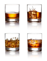 Glass of scotch whiskey and ice  on a white background