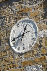 Detail of old church tower with clock
