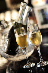 Glasses and bottle of champagne