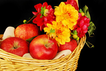 Autumn basket with apples and flowers