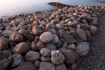 Stones On The Beach At Dusk