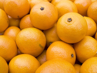 Obraz na płótnie Canvas Tangerines on a counter macro