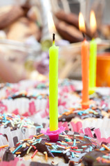 cupcake with sprinkles and candle