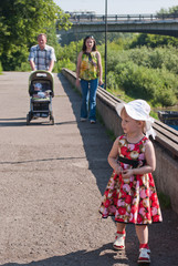 happy family walks in the park