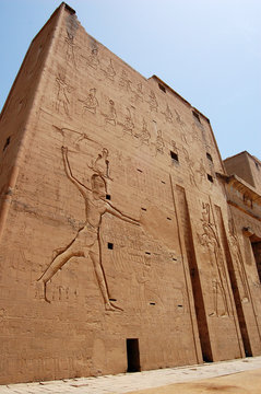 Outside wall with hieroglyphs at Edfu Temple in Egypt.