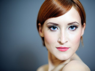 Fototapeta premium Portrait of pretty woman with pure healthy skin and natural make