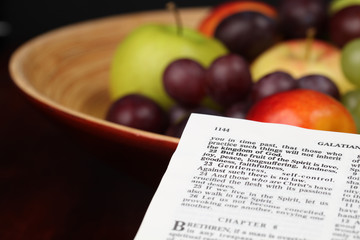 Holy Bible open to Galatians 5:22 - Fruit of the Spirit