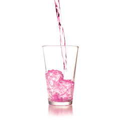 pouring cocktail on glass