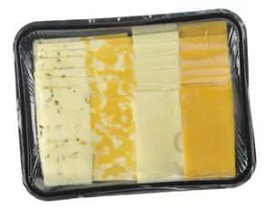 Fototapeten cheese tray slices in a vacuum package © SunnyS