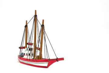 small model ship isolated on white background