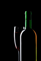 wine still life over deep black background