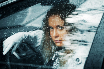 Woman and rain.