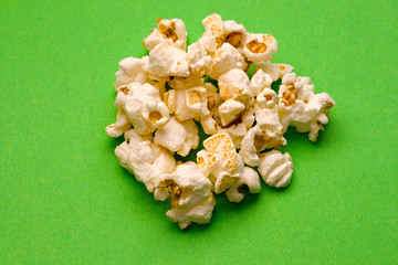 Popcorn isolated on green