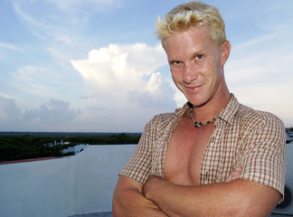 Fototapeta premium Handsome Blond Man at beach