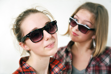 Two girls in sun glasses