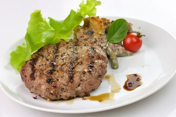 grilled hamburger with salad leaves