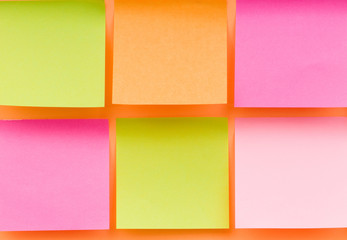 Reminder notes on the bright colorful paper