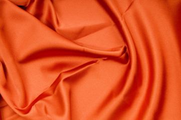 Bright satin fabric folded to be used as background